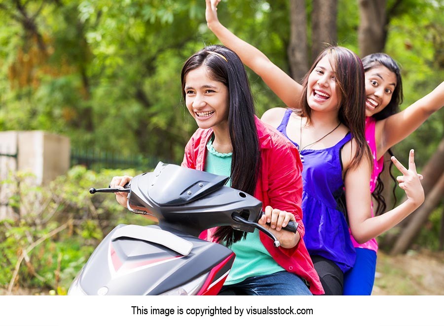 Girls Friends Riding Scooty