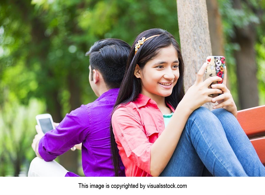 Couple Chatting Cell phone