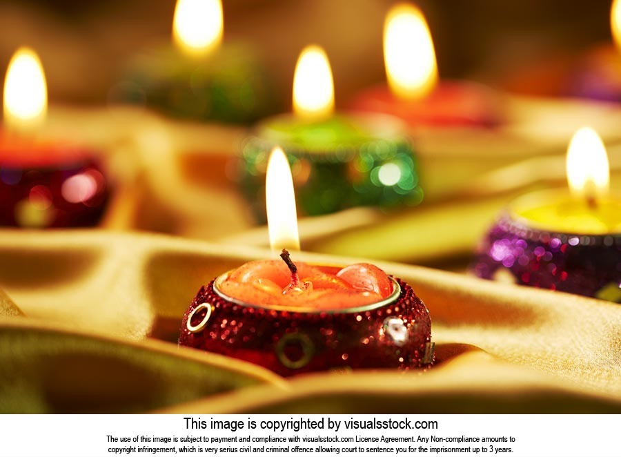 Arranging ; Burning ; Candles ; Celebrations ; Clo