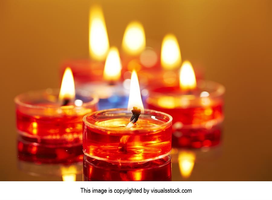 Arranging ; Burning ; Candlelight ; Candles ; Cele