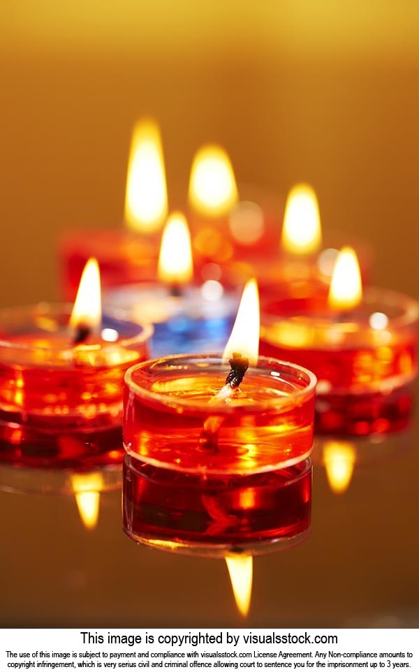 Arranging ; Burning ; Candlelight ; Candles ; Cele