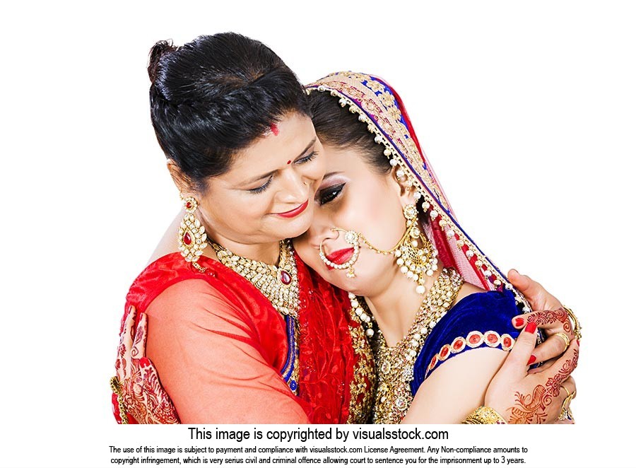 Mother Hugging Daughter Wedding
