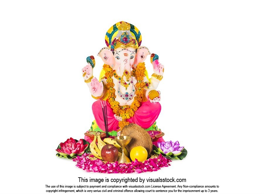 Statue-of Lord Ganesha Pooja arrangement on-white background on-Diwali  Festival in-India