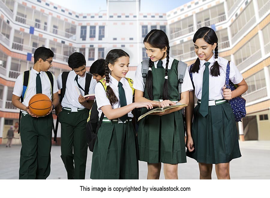 Bag ; Book ; Boys ; Buildings ; Carrying ; Classma