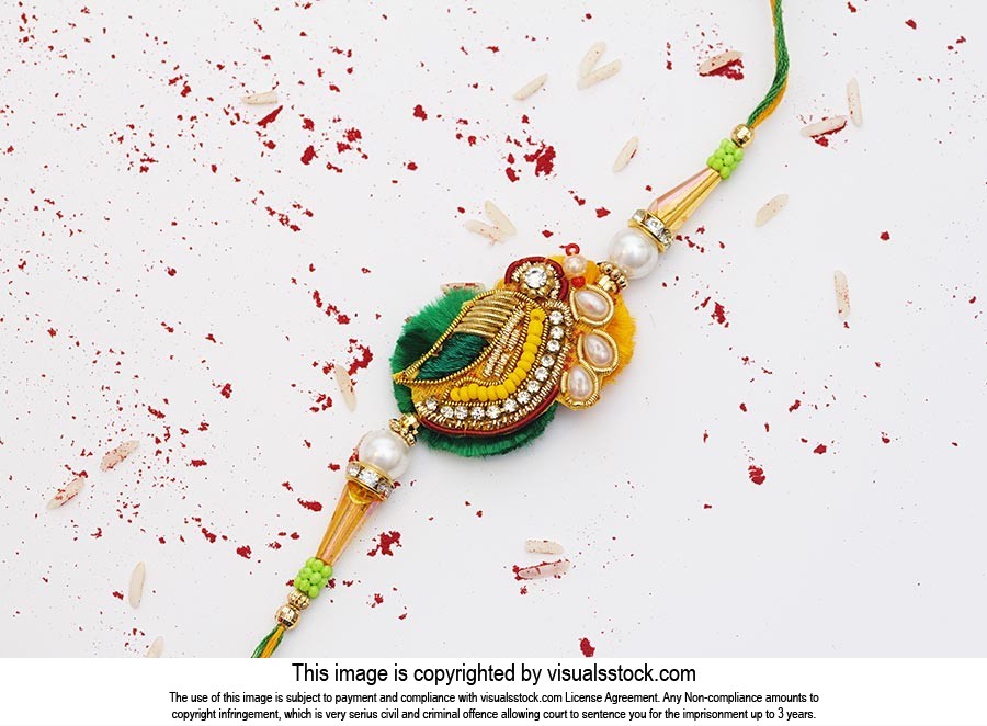 Indian-Festival Raksha bandhan Background with-An elegant Rakhi  A-Traditional Indian wristband