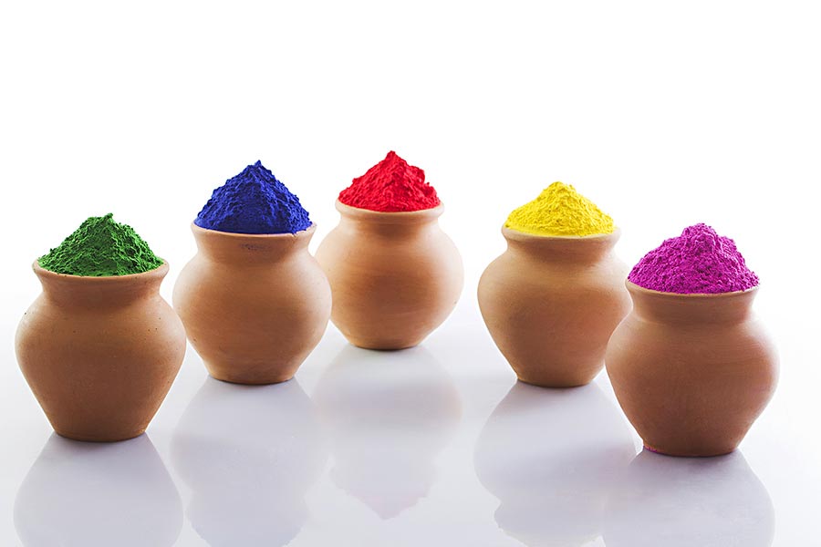 Different typeof colorful holi powder onpots onwhite background Different typeof colorful holi powder onpots onwhite background