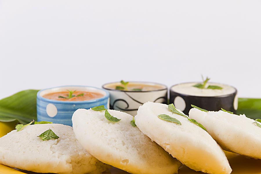 South-Indian Food Idli with sambar And Coconut-Chutney Served in-Plate