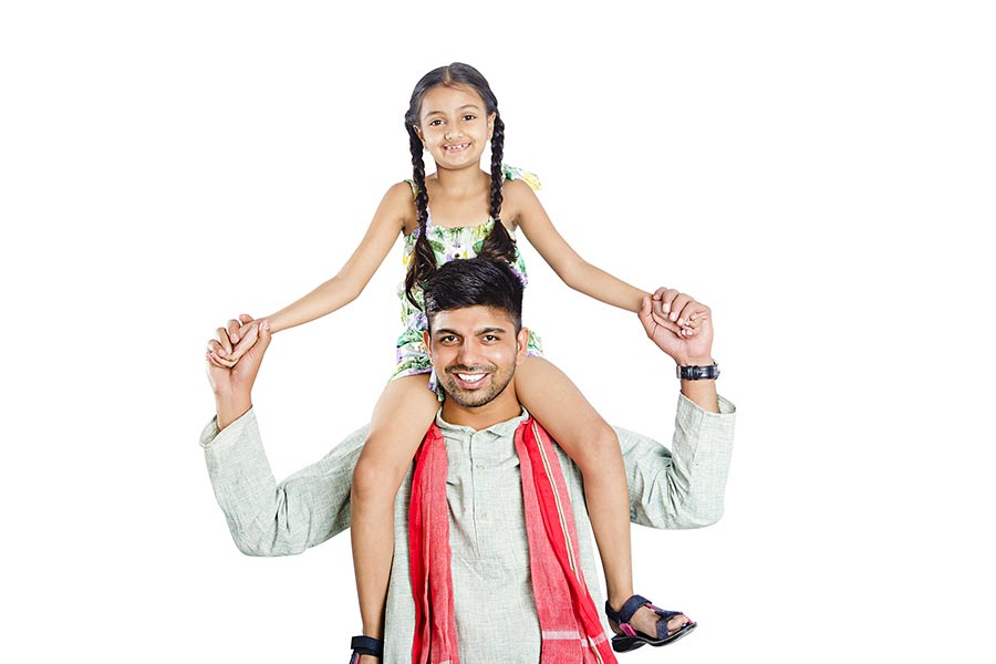 Indian Rural Farmer Father Carrying Little Daughter On Shoulders Smiling
