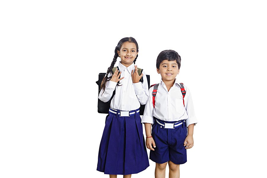 Indian Rural Kids Friend In School Uniform With Backpack Education