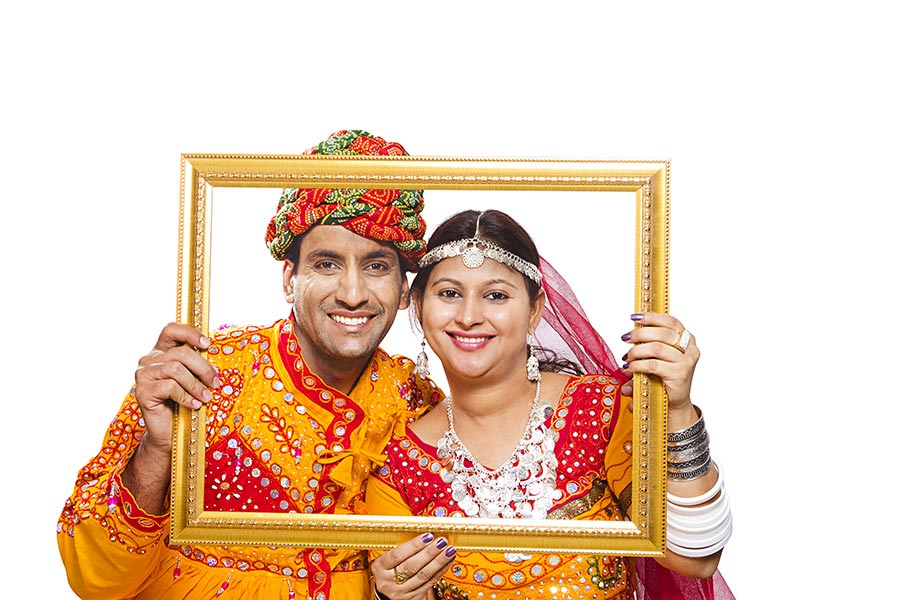 Traditional Indian Rajasthani Couple Holding Picture Frame Photography