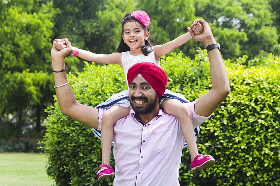 Happy Punjabi Father Carrying Her Daughter On Shoulder FunEnjoying Inp