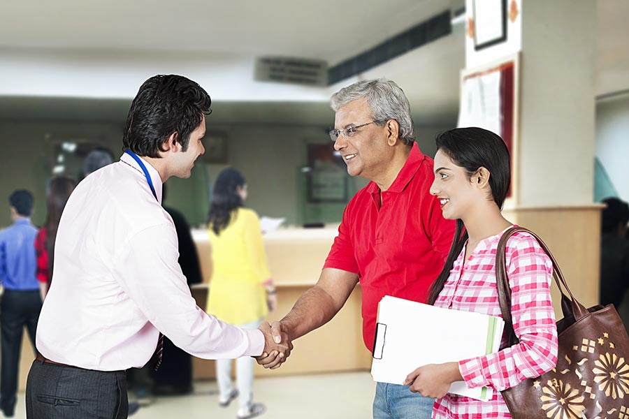 Indian Salesman Handshake Customer Marketing bank Loan Discussion