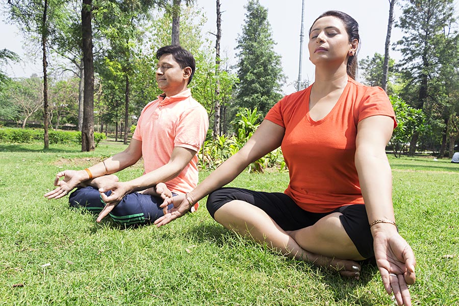 Indian Married Couple Yoga Meditating Fitness Exercising Padmasana Park