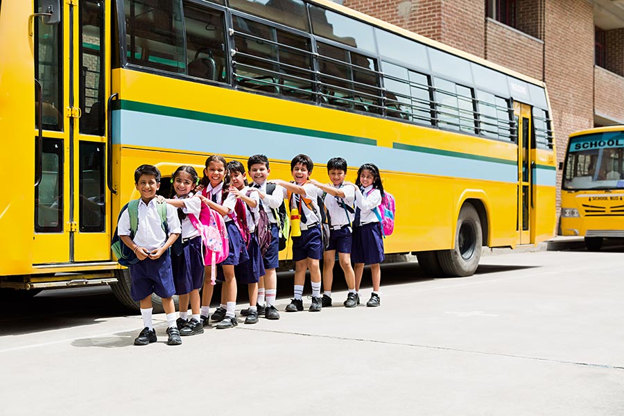 Group Indian School Kids Students Standing Queues Together Near School-Bus