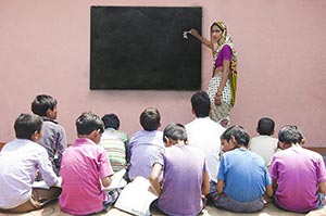 30-40 Years ; Adult Woman ; Alphabet ; Blackboard 