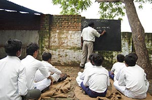 40-50 Years ; Adult Man ; Alphabet ; Blackboard ; 