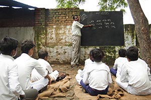 40-50 Years ; Adult Man ; Alphabet ; Blackboard ; 