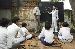 40-50 Years ; Adult Man ; Alphabet ; Blackboard ; 