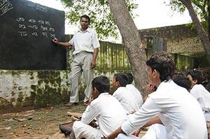 40-50 Years ; Adult Man ; Alphabet ; Blackboard ; 