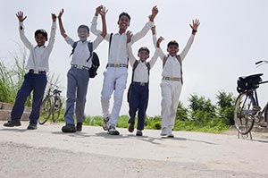 3-5 People ; Agriculture ; Arms Raised ; Backpack 