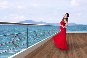Beautiful Woman Standing deck cruise ship Enjoying