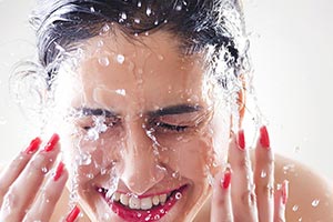 Beautiful Woman bath washing face water Splash