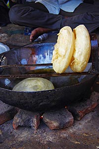 1 Person Only ; Adult Man ; Bread ; Chole Bhature 