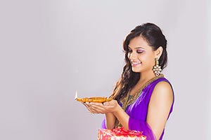 Woman Diya Celebrating Diwali