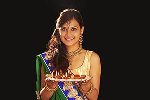 Traditional  Woman Diya Diwali Festival