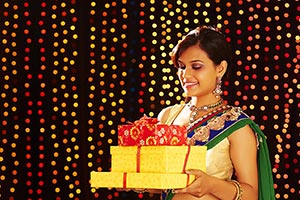 Woman Diwali Holding Gift