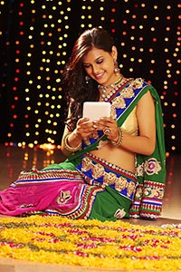 Lady Diwali Rangoli Clicking Photo