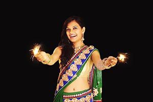 Lady Diwali Playing Fire Crackers