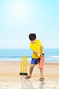 1 Person Only ; Ball ; Bat ; Batsman ; Beach ; Boy