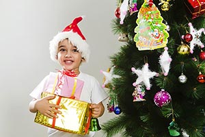 Happy Child boy presents gift celebration Christma