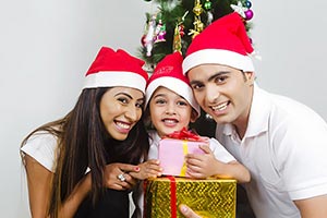 Happy Son Receiving Christmas Gift Parents Celebra