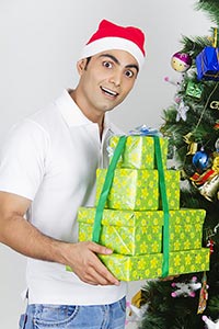 Man Presents Gifts Christmas Celebration Smiling