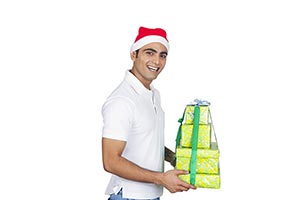 Happy Man Wrapped gift box Showing Christmas Festi