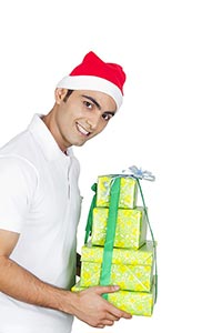 Man Wrapped gift box Showing Christmas Celebration