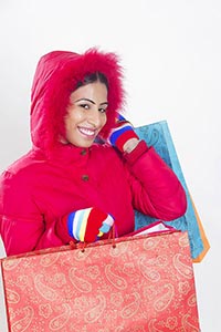 Indian Woman winter clothes shopping bags Smiling