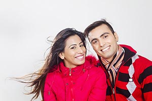 Smiling couple in winter clothes Enjoy