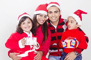 Indian Family Christmas Gifts Celebration Smiling