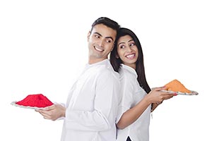 Couple Holi Festival Enjoying Holding Powder Colou