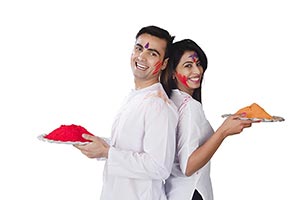 Indian couple holi Celebration colours enjoying sm