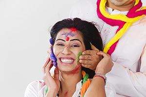 Couple Holi Celebrating Enjoy applying Colour Smil