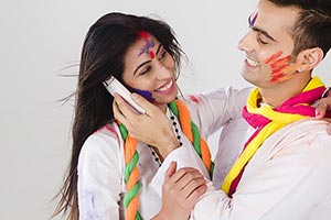 Couple Holi Festival Celebration Fun Talking Phone