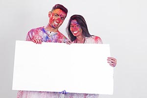 Indian Couple Holi Celebrating Showing Message Boa