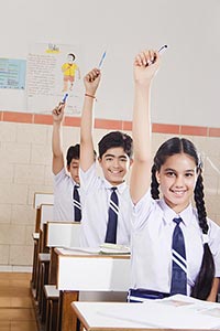 School Students Classroom  Hand Raised