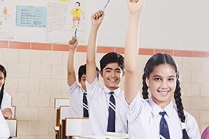 School Students Classroom  Hand Raised