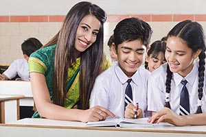 Teacher Helping Students Classroom