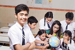 Teacher Students Studying Globe